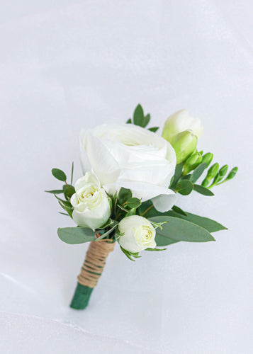 White Ranunculus Boutonniere - Toronto Flower Gallery
